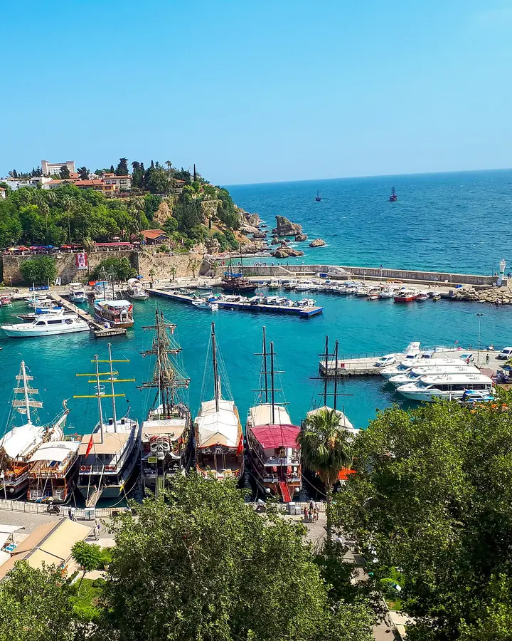 Antalya’s old harbour from above: boats moored below the cliffs of Kaleiçi, the sea beyond
